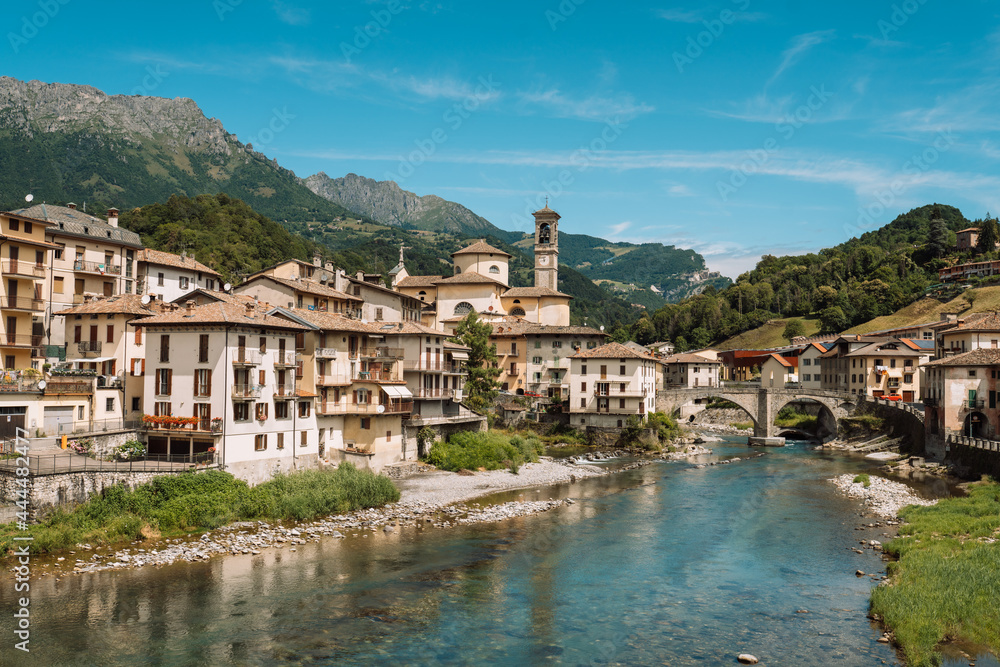 San Giovanni Bianco, seen from the Brembo river, Lombardy, Italy. Village of Two Rivers, small town in northern Italy.