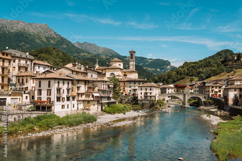San Giovanni Bianco, seen from the Brembo river, Lombardy, Italy. Village of Two Rivers, small town in northern Italy. photo
