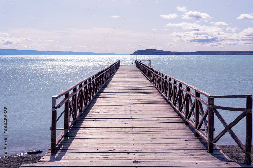 pier in the lake in a beautiful day in El Calafate, Argentina