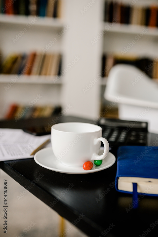 cup of coffee on a table cup of coffee on a table