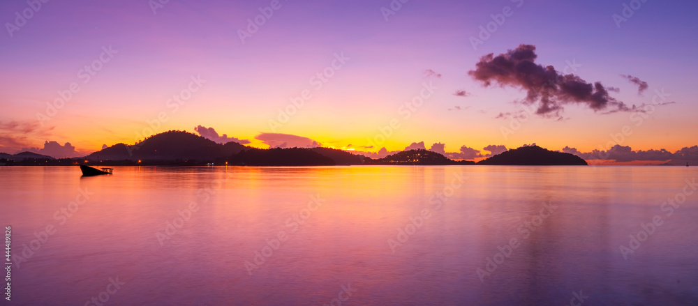 Long exposure colorful sunset or sunrise over sea Clear sky sunset with reflection light on sea surface Idyllic amazing landscape Climate change Beauty in nature environment.