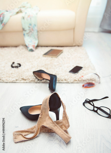 Bedroom mess with lingerie and shoes, quick sex concept