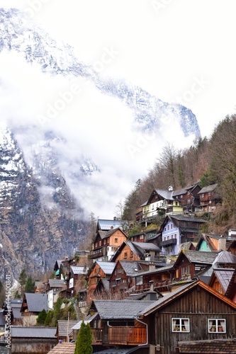 View of famous Hallstatt small village and the backdrop of snow-capped mountains. © PRANGKUL