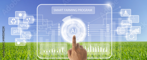 Farmer push AI button on tablet for statistics collection Analyze agricultural data with intelligent AI technology. Smart agriculture and mogern farming concept.
