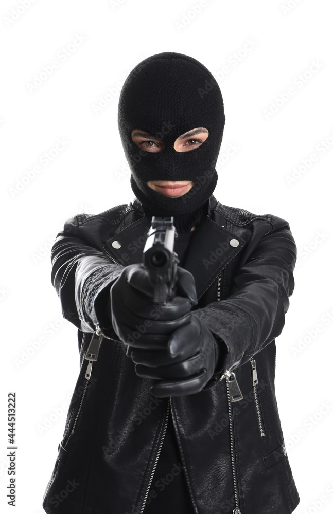 Woman wearing knitted balaclava with gun on white background Woman wearing knitted balaclava with gun on white background