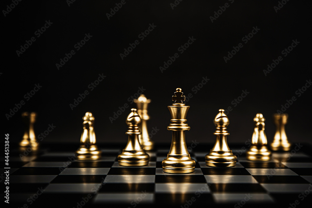 King and bishop and knight chess standing teamwork on chess board concepts of business team and leadership strategy and organization risk management. King and bishop and knight chess standing teamwork on chess board concepts of business team and leadership strategy and organization risk management.