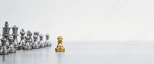 Close-up chess standing first in line teamwork on chess board concepts of business team and leadership strategy and organization risk management. photo