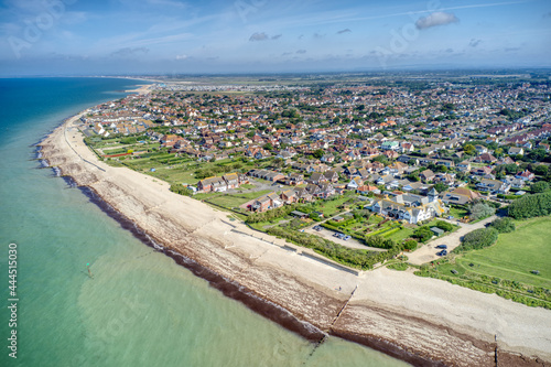 Selsey Bill aerial view over south beach and the popular seaside resort town of Selsey in West Sussex.
