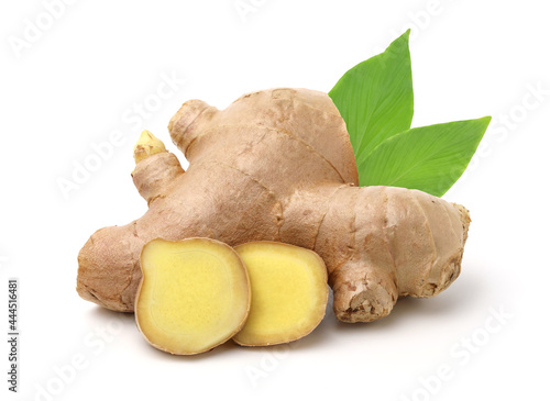 Fotografia Close up, Fresh ginger rhizome with sliced and green leaves isolated on white background