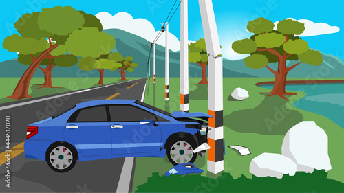Rotating car crashed into an electric pole on the side of the road until the front was damaged and fractured. Asphalt road leading to the highlands had mountains and blue skies in the background.