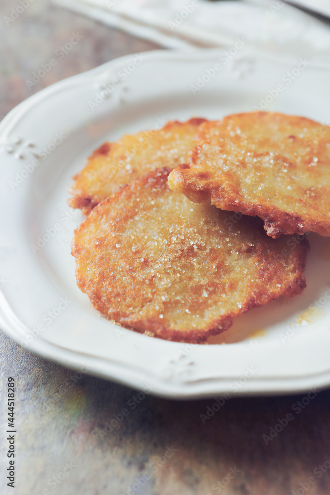 Potato pancakes on stone background. Close up. Potato pancakes on stone background. Close up.
