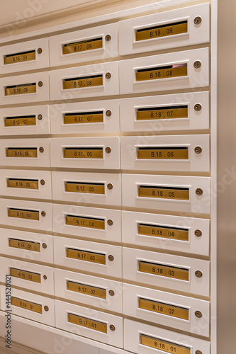 Rows of mailbox in lobby of residential condominium building