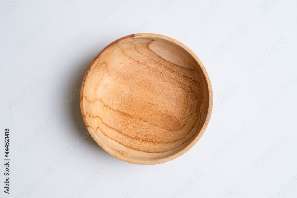 Empty wooden bowl on white background Empty wooden bowl on white background