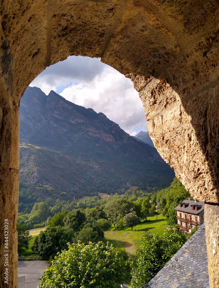 UNESCO World Heritage.
First Romanesque church of Sant Joan in the village of Boí. (11-12 century). Landscape view from the bell tower. Valley of Boi. Spain.