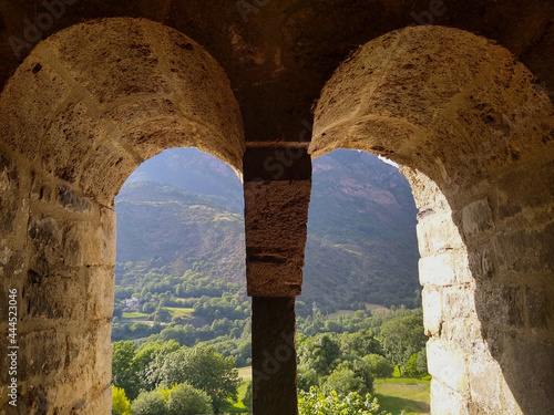 UNESCO World Heritage. First Romanesque church of Sant Joan in the village of Bo  .  11-12 century . Landscape view from the bell tower. Valley of Boi. Spain.
