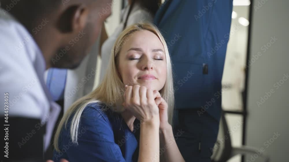 Multi-ethnic Group of Radiologists Discussing Diagnosis Using Monitors Showing Brain Scans Results, MRI or CT Scan Procedure in Hospital Multi-ethnic Group of Radiologists Discussing Diagnosis Using Monitors Showing Brain Scans Results, MRI or CT Scan Procedure in Hospital