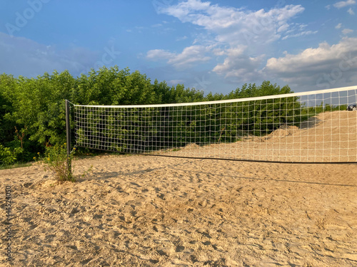 an empty beach volleyball court © Olga Bugro