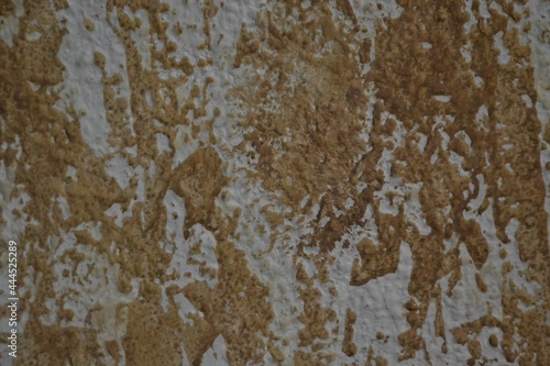 A wall painted in white and brown