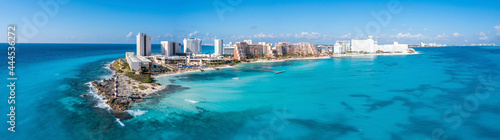 Aerial panoramic view of Punta Norte beach, Cancun, Mexico. Beautiful beach area with luxury hotels near the Caribbean sea in Cancun, Mexico.