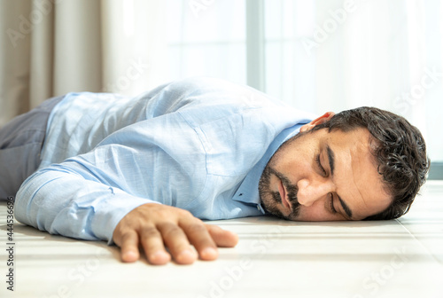 depressed middle aged arab man on a floor