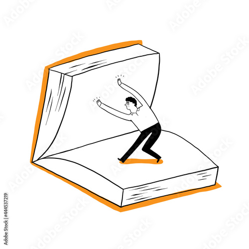 A man, a student or a businessman is flipping over a large book