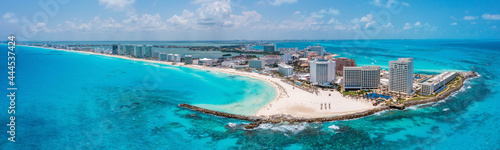 Aerial panoramic view of Punta Norte beach, Cancun, Mexico. Beautiful beach area with luxury hotels near the Caribbean sea in Cancun, Mexico.
