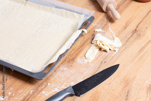 Cooking pizza in the kitchen. Pizza making process