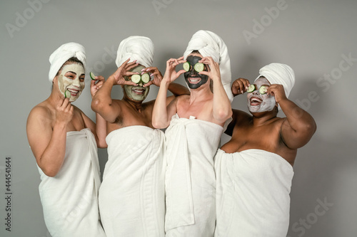 Happy multiracial women having skin care spa day - People selfcare concept