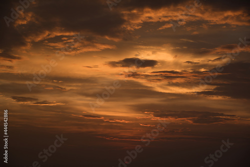 Beautiful, stunning golden sky during the sunset at Promthep Cape landmark viewpoint in Phuket