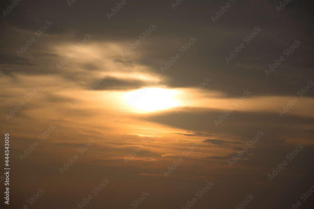 Beautiful, stunning golden sky during the sunset at Promthep Cape landmark viewpoint in Phuket Beautiful, stunning golden sky during the sunset at Promthep Cape landmark viewpoint in Phuket