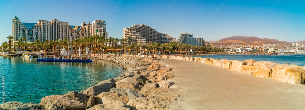 Panoramic view from central stone walking pier and promenade in Eilat - famous tourist resort city in Israel 