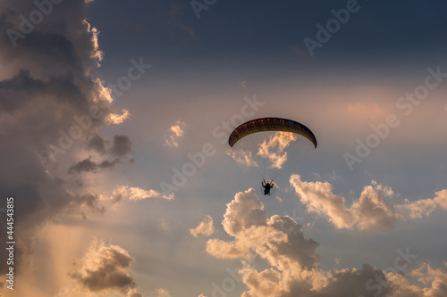 Paramotor on the sky during golden hour
