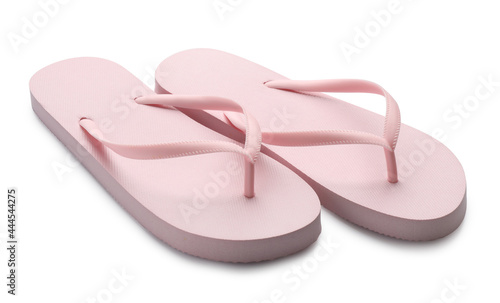 Stylish pink flip flops on white background. Beach object