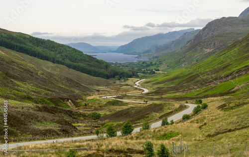 A road winding down a Highland valley © NosamA