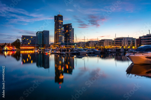 Panorama of the marina in Gdynia with modern architecture at dusk. Poland