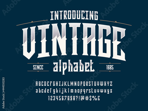 Vintage label style alphabet design with uppercase, lowercase, numbers and symbols