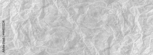 Abstract white fabric texture background cloth soft wave creases of satin and cotton.