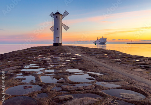 Swinoujscie. The famous mill lighthouse at sunrise.