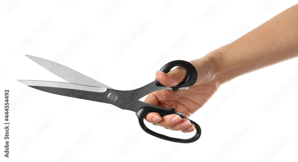 Woman holding tailor's scissors isolated on white, closeup Woman holding tailor's scissors isolated on white, closeup