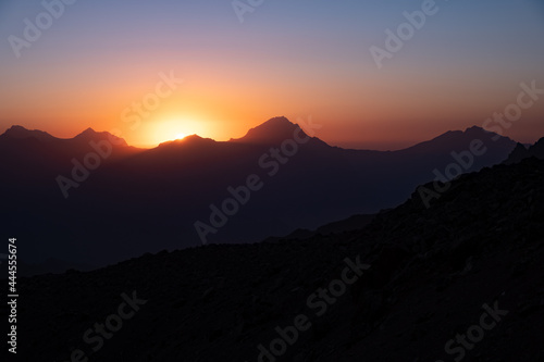 colorful sunset on the top of fann moutains. © Jaromr