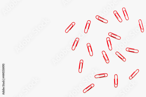 paper clips on a white background, stationery on a white background, paper clips 