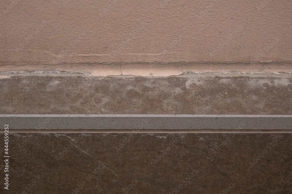 Fototapeta premium wall of light brown, gray marble, and brown materials, horizontally. background texture, wall