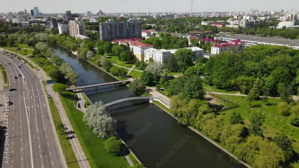 Drone flies over city river Drone flies over city river