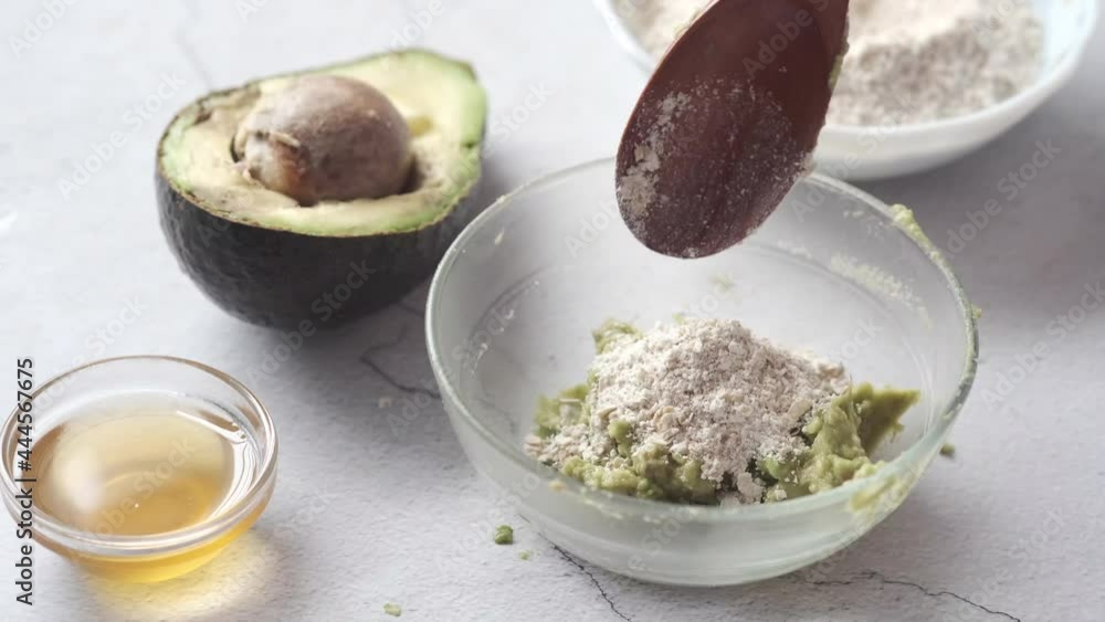 making homemade natural avocado cosmetic on table making homemade natural avocado cosmetic on table