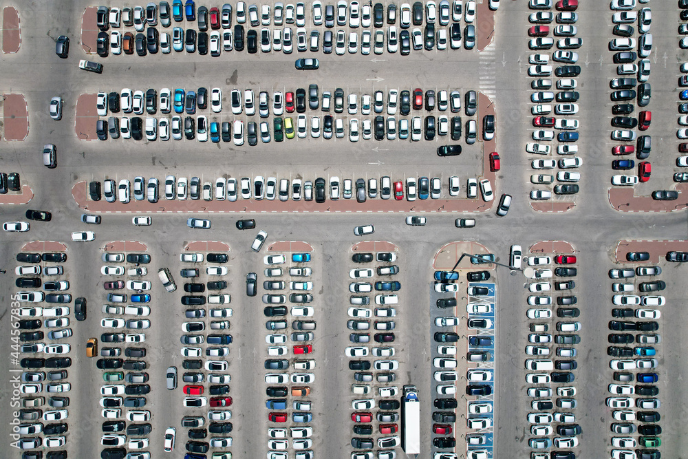 Car parking of a shopping center, top-down aerial shooting. Car parking of a shopping center, top-down aerial shooting.