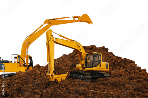 Two excavators are digging the soil in the construction site on white background,With bucket lift up