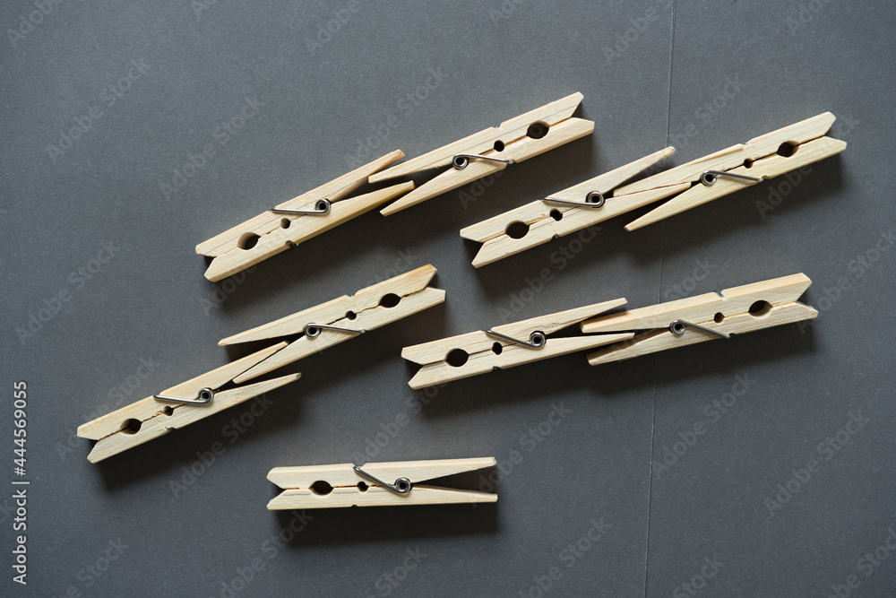 clothes pins on dark gray bakcgorund clothes pins on dark gray bakcgorund