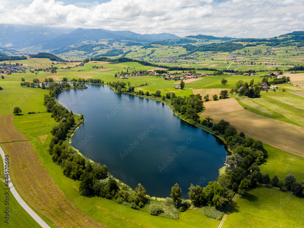 Aerial image of Gerzensee lake in Bern Oberland, Switzerland