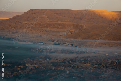 The view of the Mortuary Temple of Hatshepsut and Luxor at sunrise  the view from hot air balloon  Luxor  Egypt