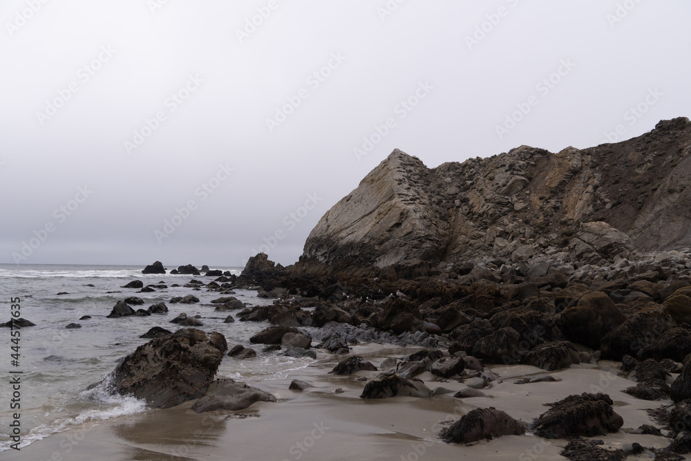Jagged Rocks with a light Fog off the beach of the Pacifica Coast